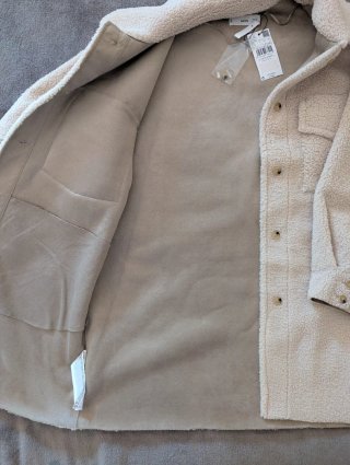 Chaqueta de pelo sintético beige