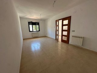 Casa adosada en venta en Tomelloso