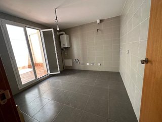 Casa adosada en venta en Tomelloso