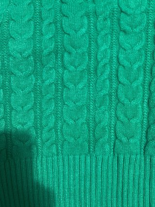 Chaleco verde color muy favorecedor