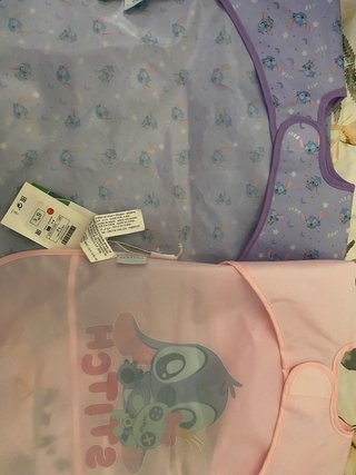 Baberos con manga de Stitch nuevos