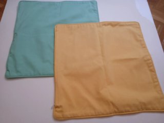 Fundas cojín color turquesa y amarillo