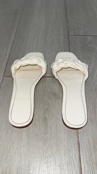 Sandalias planas piel trenzada blancas