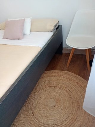 Cama individual negra y verde