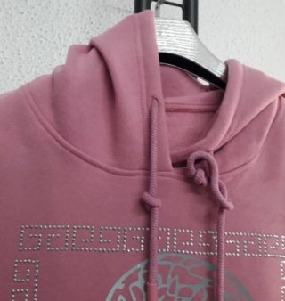Sudadera rosa con  calavera pedrería