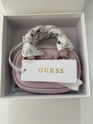 Cartera Guess dorada. Precio negociable.
