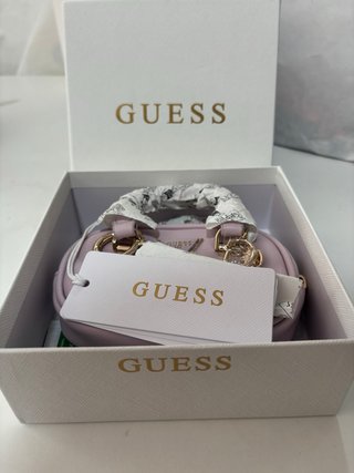 Cartera Guess dorada. Precio negociable.