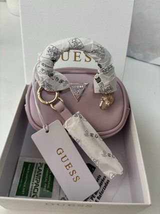 Cartera Guess dorada. Precio negociable.