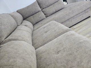 Sofá gris de tela