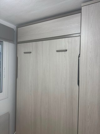 Mueble de dormitorio: Cama abatible con Armario.
