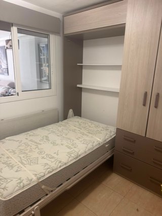 Mueble de dormitorio: Cama abatible con Armario.