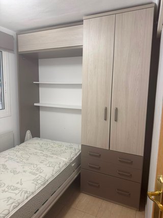 Mueble de dormitorio: Cama abatible con Armario.