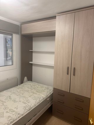 Mueble de dormitorio: Cama abatible con Armario.