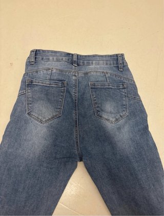 Jeans vita alta a zampa