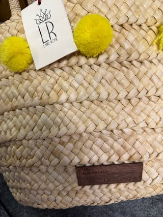 Borsa mare paglia Labelrose con pompon gialli