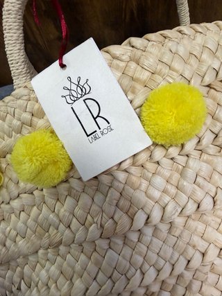 Borsa mare paglia Labelrose con pompon gialli