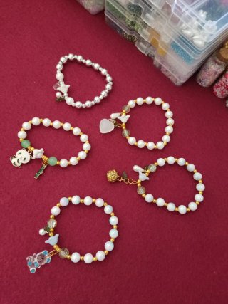 Pulseras con dijes de animales