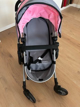 Carrito de muñecas rosa y gris