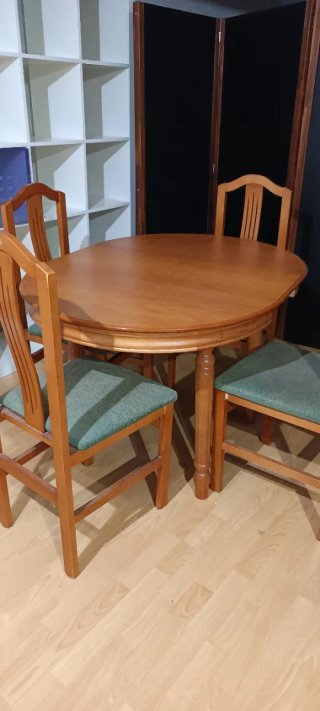 Mesa redonda extensible. Madera y cubierta cristal