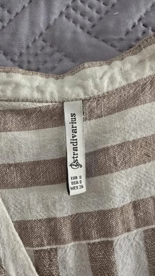 Chaleco rayas beige y marrón Stradivarius T.S