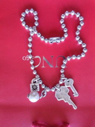 Collar Uno de 50 con llaves y perla