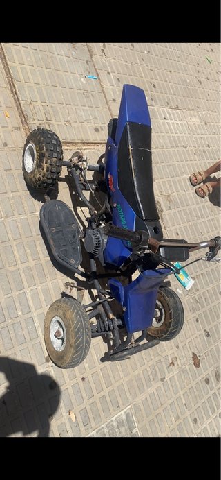 Quad infantil azul y negro