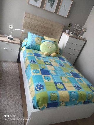 Edredón infantil reversible y cojín