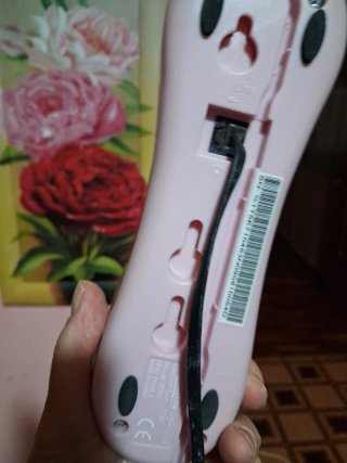 Telefono fisso rosa e bianco