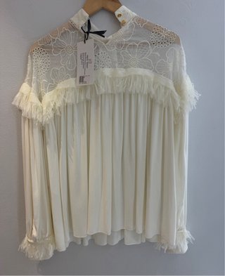 Blusa romántica con flecos y tul