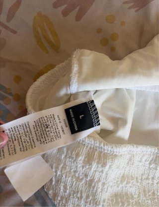 Top blanco halter con nudo