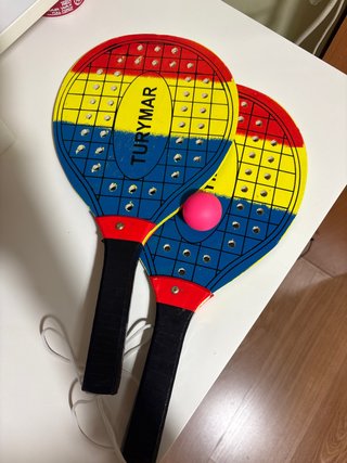 Juego de palas y pelota rosa
