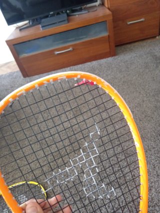 Raqueta Squash Artengo Naranja y Negra