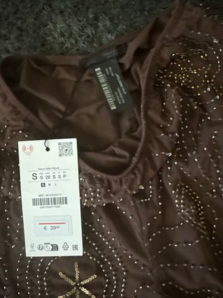 Pantalones Zara semitransparentes marrones y dorad