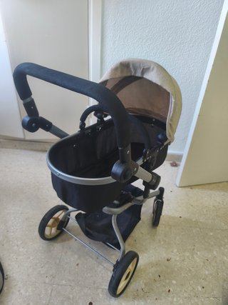 Cochecito de bebé de juguete