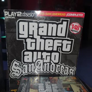 PlayStation 2 Negra + Mando + 4 Juegos