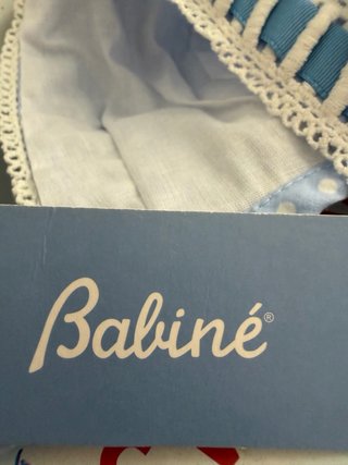 Capota bebé azul con lunares blancos