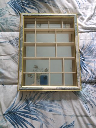 Vitrina expositora de madera y cristal