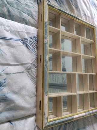 Vitrina expositora de madera y cristal