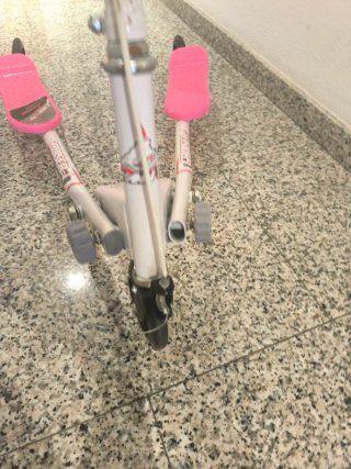 Patinete tijera 3 ruedas rosa.