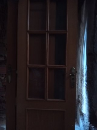 Puerta interior de madera con cristales