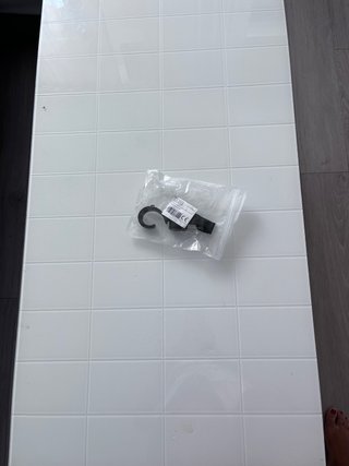 Gancho universal para carrito de bebé