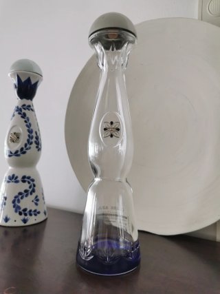 Botella decorativa con flor