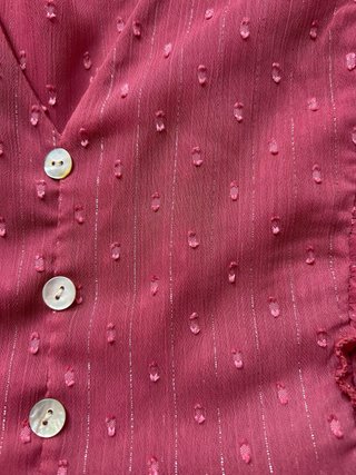 Blusa rosa con volantes