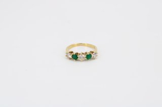 049-01-00351 Anillo de oro 18K con piedra de color