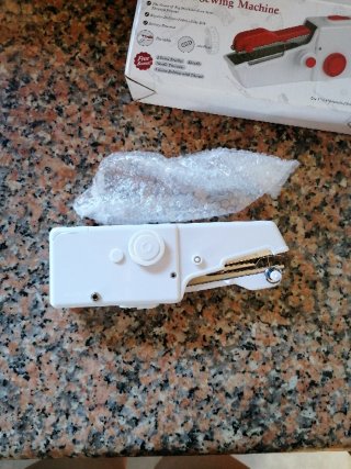 Máquina de coser de mano
