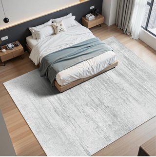 Alfombra decorativa gris y blanca