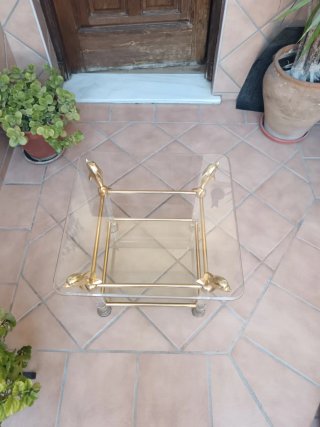 Mesita de salón cristal y metal dorada
