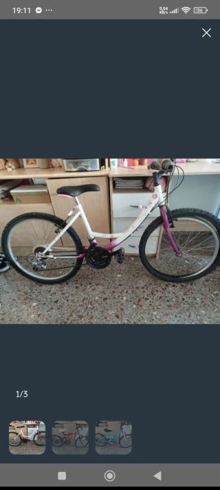 Bicicleta infantil blanca y rosa