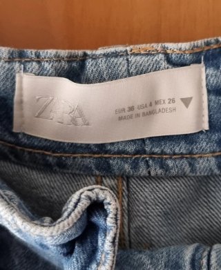 Jeans vita alta con cintura