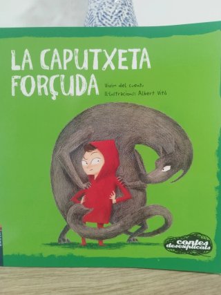 La Caputxeta forçuda